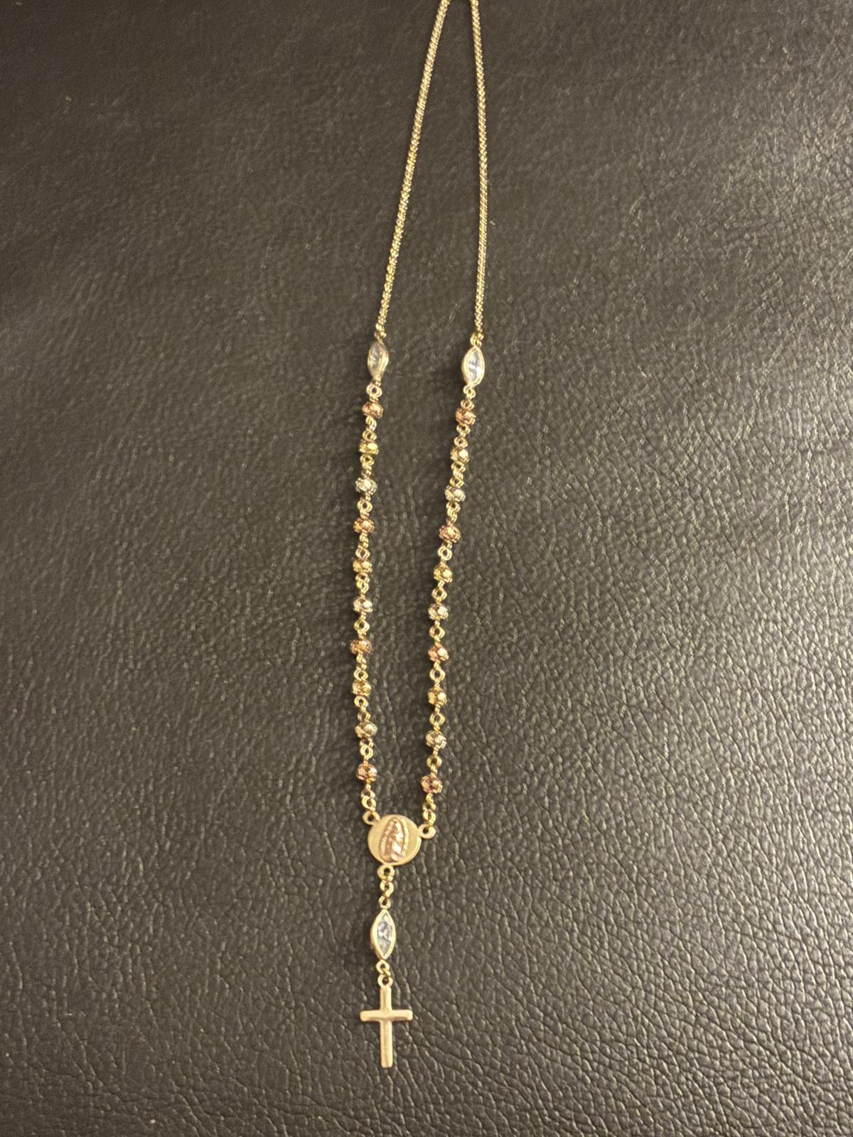 Gold rosary necklace with cross and medallion