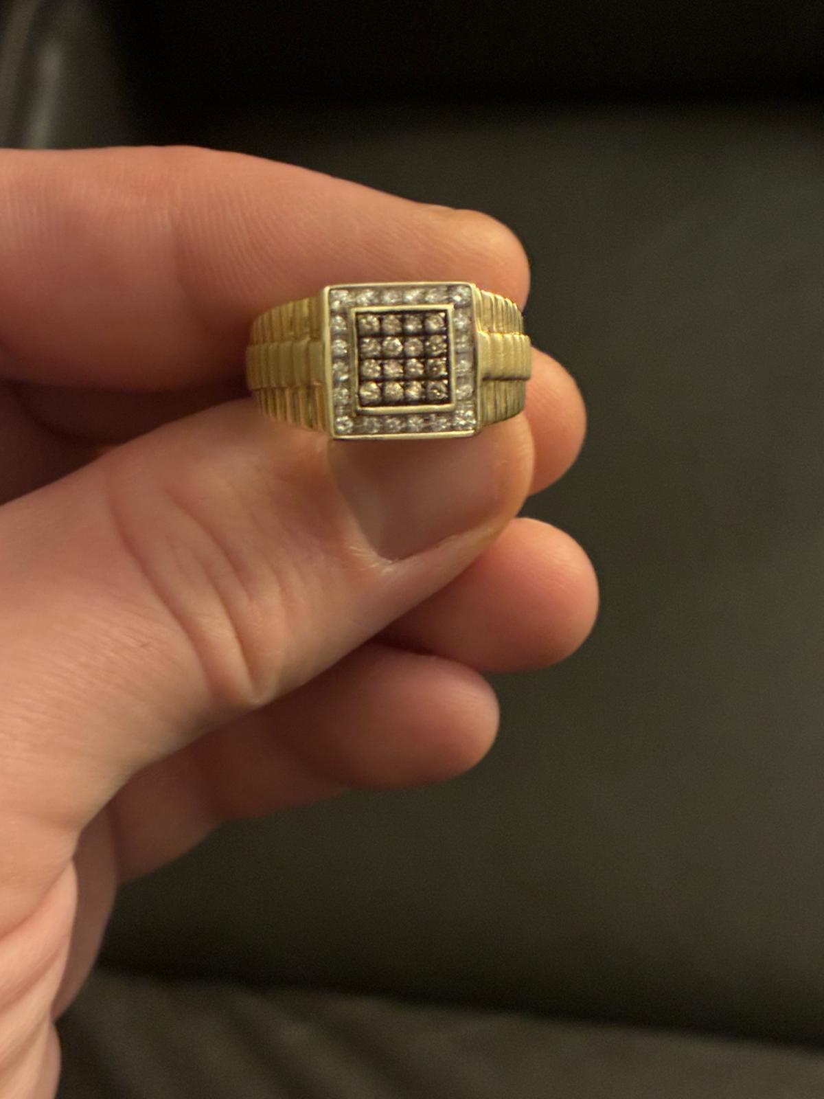 Square faced gold ring with multiple pavé rows of diamonds