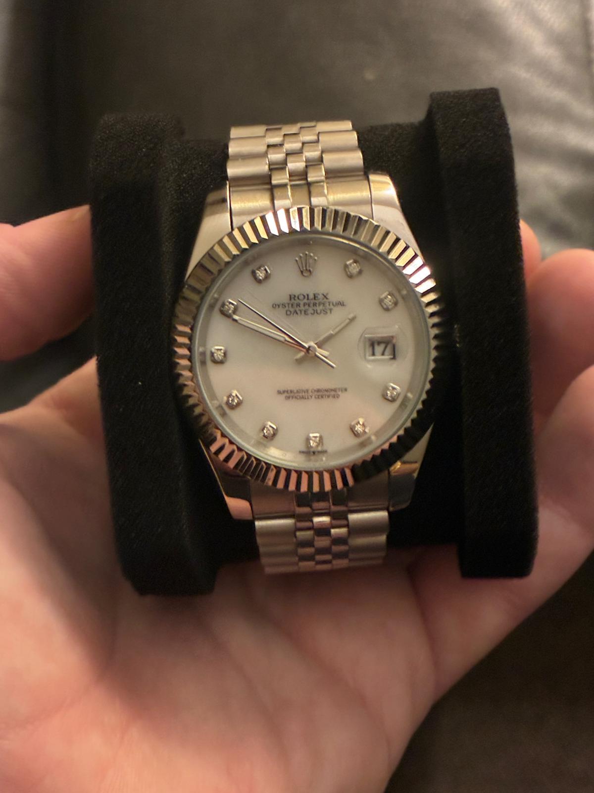 Stainless Rolex Datejust with diamond hour markers