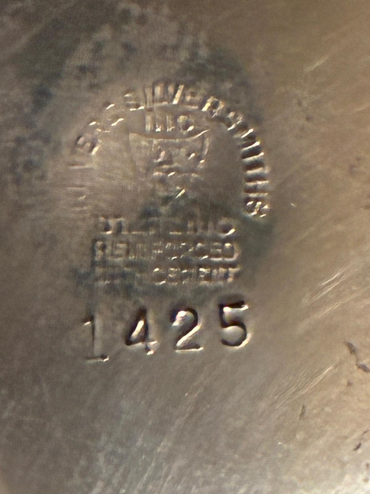 Close-up of International Silver Co hallmark stamped 1425