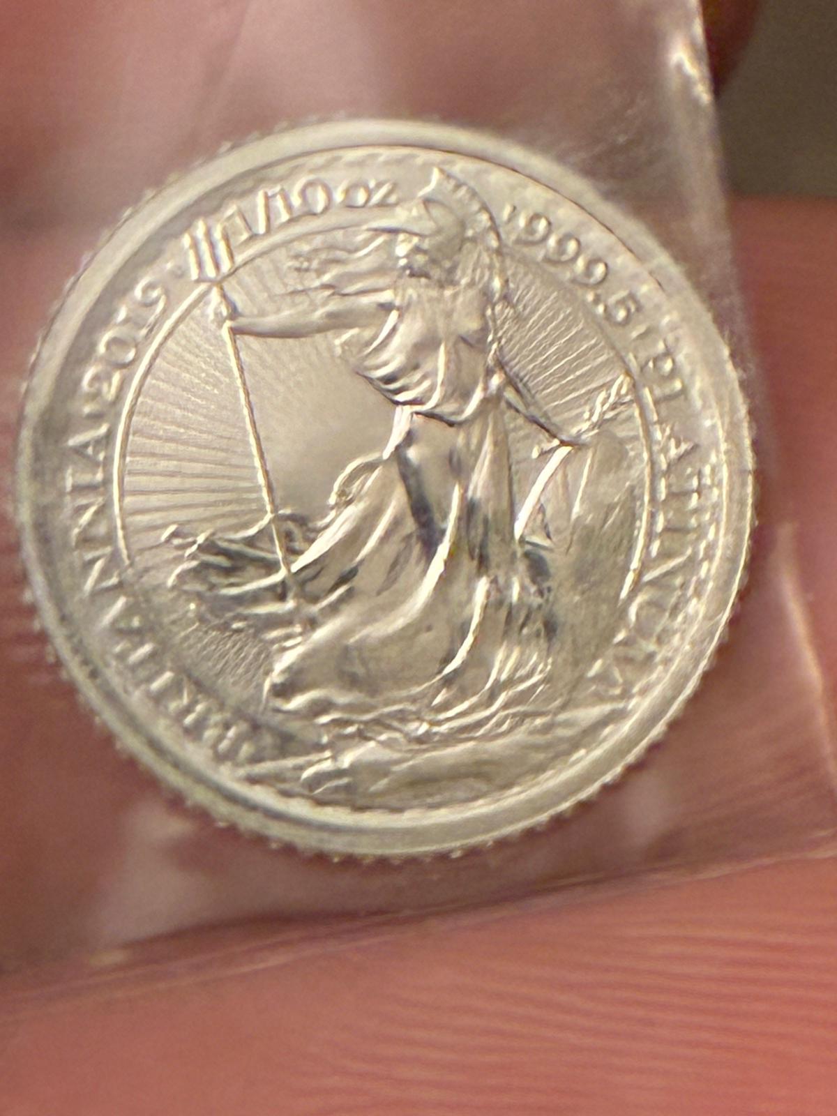 Reverse of a Britannia coin showing Britannia holding a trident