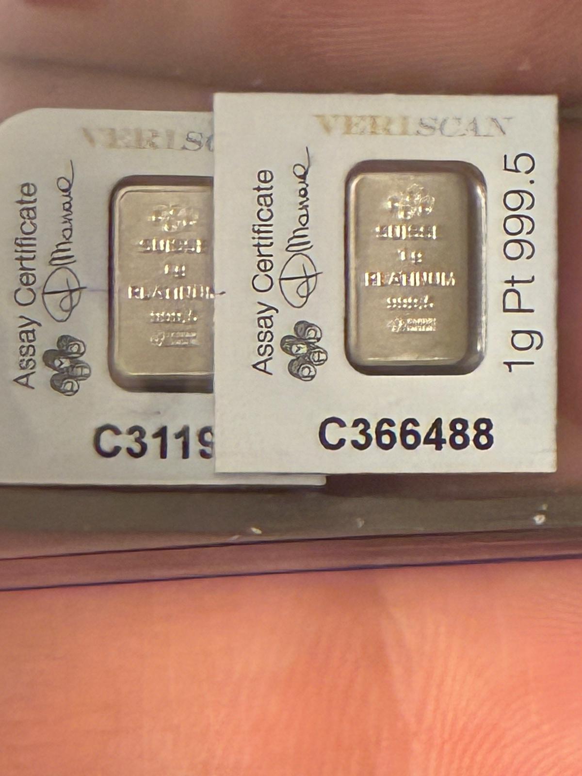 Two 1g Credit Suisse platinum bars in assay cards